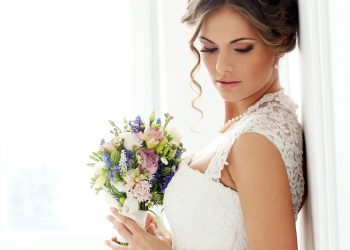 Wedding. Beautiful bride with bouquet